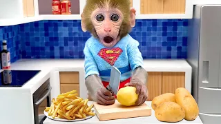 Baby Monkey Bon Bon cooking french fries and swims with the funny duckling in the water park