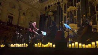 “Merry-Go-Round of Life” by Joe Hisaishi performed by the Fever Candlelight Orchestra