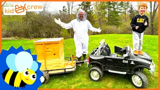 Caring for honey bees with ride on truck and trailer. Educational how beehives work | Kid Crew