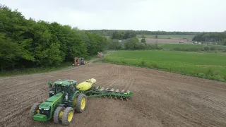 Planting Corn next to an outdoor concert