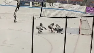 Chase takes the breakaway and beats the goalie around the leg