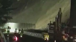 Road workers run from mudslide in California