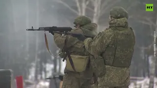 Russian troops conduct military exercises on training grounds in Belarus as President Putin