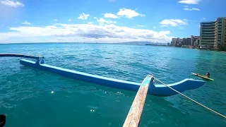 Surfing on an Outrigger Canoe