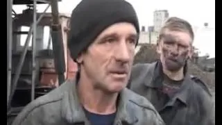 Drunken Russian construction worker lands with his face in a puddle of dirt