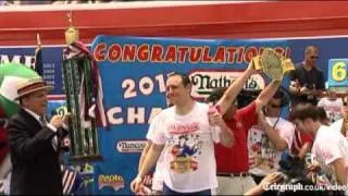 World Hot dog eating champion eats 62 sausages in 10 minutes