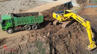 Komatsu PC210 Excavator Work In Mud Remove Out Road Loading On Dump Truck
