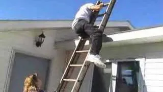 Paraplegic climbs ladder onto roof!