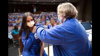 COVID-19 Vaccinations Begin for UK Front-line Health Care Workers