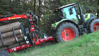 Abtransport mit Rückewagen Stepa M16 an CLAAS ARION 550 CIS CMATIC