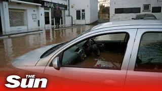 Storm Dennis: Cars swept away amid fears fifth person killed in flooding