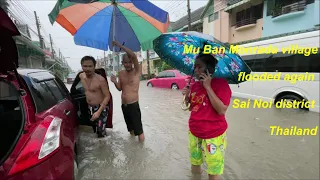 Mu Ban Monrada village flooded again Sai Noi district Thailand