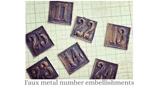 Faux metal number embellishments