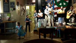Cotton Pickin Kids sing "Rocky Top" while the two youngest sisters dance up a storm