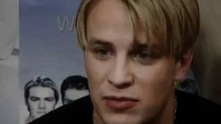 Westlife with Kian Egan and Nicky Byrne speaking about their singles