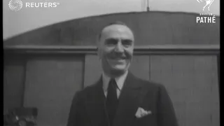 WORLD WAR 2: World War One air ace Eddie Rickenbacker visits US airmen in England (1943)