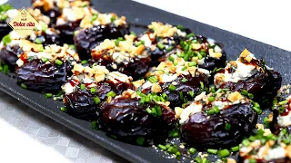 Festive snack Dates with cheese. Appetizer for the holiday table