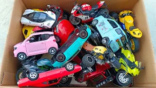 BOX FULL of a lot of diecast Cars and motorcycle, Audi, Rolls Royce, Mini EV, Jeep, Dodge Charger.
