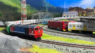 Indonesian Railways Miniature BB301 & CC300 Locomotives pull very long passenger car