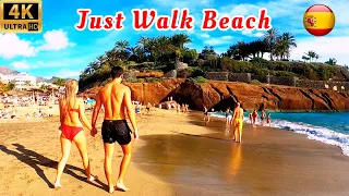 Walking tour of Playa del Duque beach. People, sand, sun and water. Spain 4K