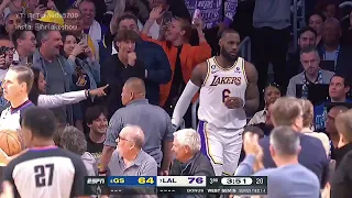 LeBron James HUSTLES & jumps over the 1st row and into the crowd 😂