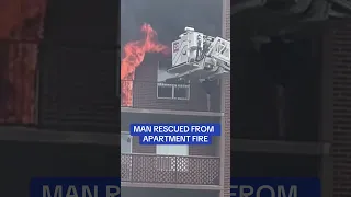 Terrifying moment man escapes apartment fire