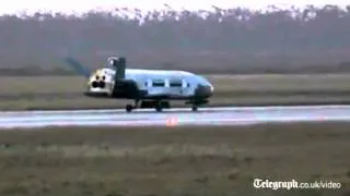 US shuttle returns after secret space mission