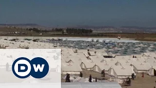 Турция "приоткрыла" границу для беженцев из Сирии