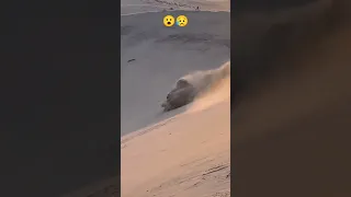 Dubai desert safari / big accident of landcruiezer Laying down from mound