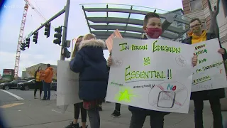 Bellevue parents rally to send students back to school