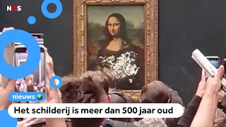 Mama Mia! Man besmeurt Mona Lisa met taart