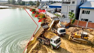 Wow!! Many Dump Trucks Working Hard To Loading Soil Slide Into Water To Compact The Land With Dozer