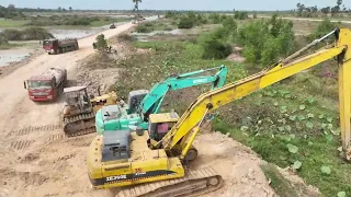 Great Project Bulldozer And Dump Truck Building New Road Over Mud Water Bulldozer Clearing Dirt