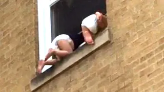 Strangers Pitch In to Save Toddlers Dangling Out Chicago Window