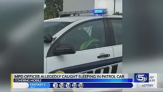 Mobile Police investigating photos of officer possibly sleeping in patrol car