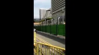 Some crazy engine sound of F1 car in Singapore Grandprix 2013 , warming up the car before race