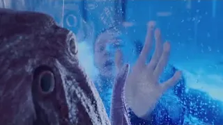 The girl is trapped in the tank, and the mutant octopus actually finds the key!