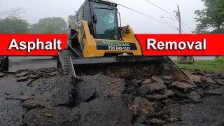 Removing asphalt driveway using ASV trackloader