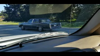 1989 Cadillac Fleetwood Brougham on the freeway