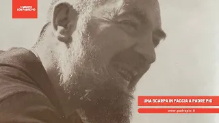 Una scarpa in faccia a Padre Pio