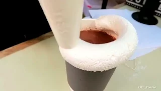 This hot chocolate has a circle of marshmallow on the rim