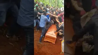 FIGHTING OVER COFFIN