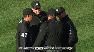 TOR@OAK: Call overturned in the top of the 2nd inning