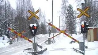 Finnish freight train 3365 passed Eerola level crossing