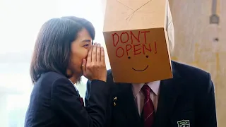 Handsome Boy Covers His Face With A Box Because He Is Tired Of All Girls Following Him