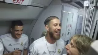 Real Madrid players celebrate La Undécima at 30,000ft!