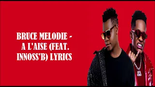 Bruce Melodie - A l’aise (Lyrics Video) ft  Innoss’B