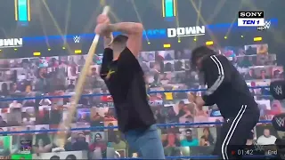 Rey Mysterio and Dominik Mysterio attacks Roman reigns with sticks | fridaynightsmackdown June112021