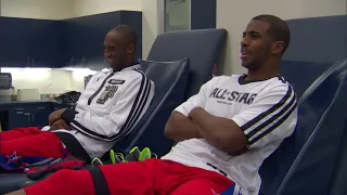 Chris Paul jokes with Kobe Bryant about the patches on their All-Star jackets in 2013