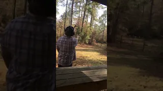 .44 Magnum hits bottle